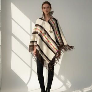Vintage 1970s cream wool Aztec poncho cape with pompoms and fringe details